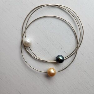 Three band simple and beautiful Pearl Trio Bracelet.